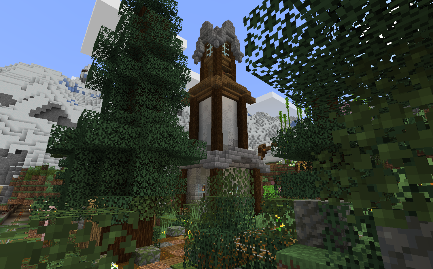 A tower stands in the middle of a valley